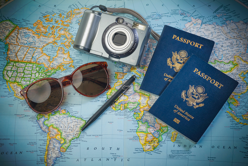 passports on top of a map to symbolize travel